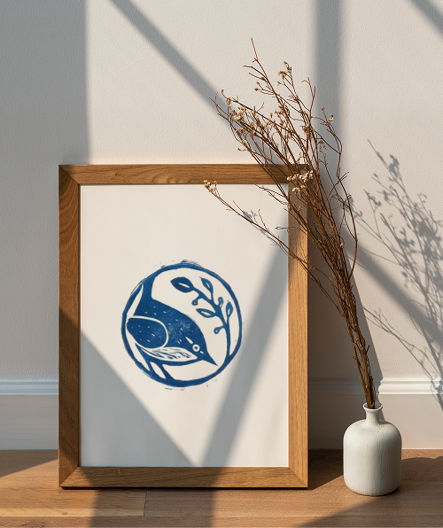 Linocut print of a bird in dark blue